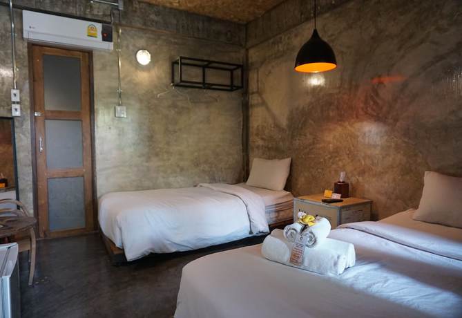 Imagen de la habitación del Hotel Huen Chang Puek. Foto 14