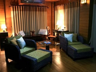 Imagen de los interiores del Hotel Huen Come Residence Chiang Mai. Foto 4