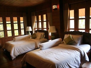 Imagen de la habitación del Hotel Huen Come Residence Chiang Mai. Foto 3