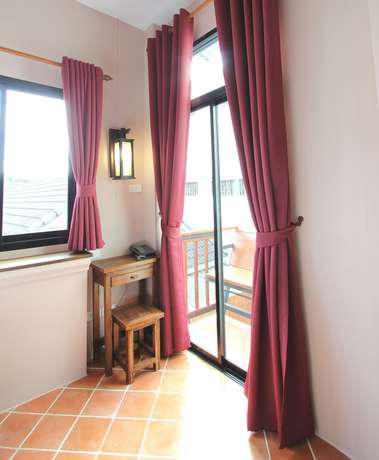 Imagen de la habitación del Hotel Huen Hug Chiang Mai. Foto 6