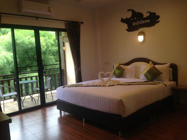 Imagen de la habitación del Hotel Hugpua. Foto 19