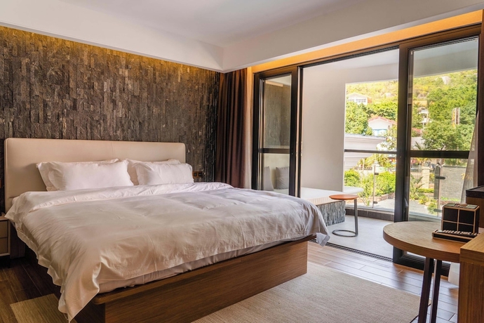 Imagen de la habitación del Hotel HuiZhou The Ushuaia Resort. Foto 4
