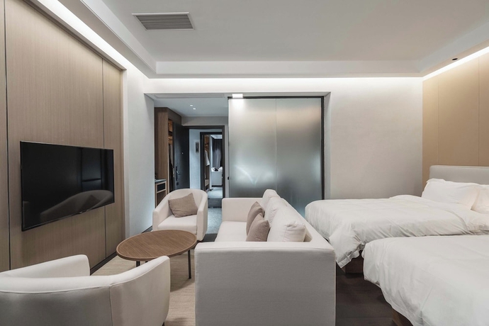 Imagen de la habitación del Hotel HuiZhou The Ushuaia Resort. Foto 11