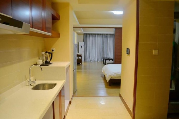 Imagen de la habitación del Hotel Huidong Ganghui Holiday. Foto 3