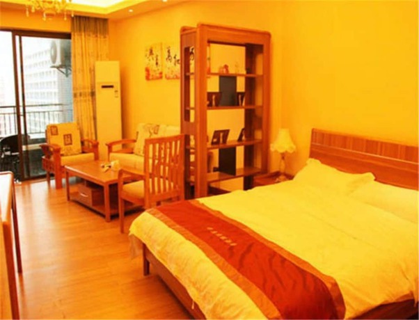 Imagen de la habitación del Hotel Huidong Ganghui Holiday. Foto 11