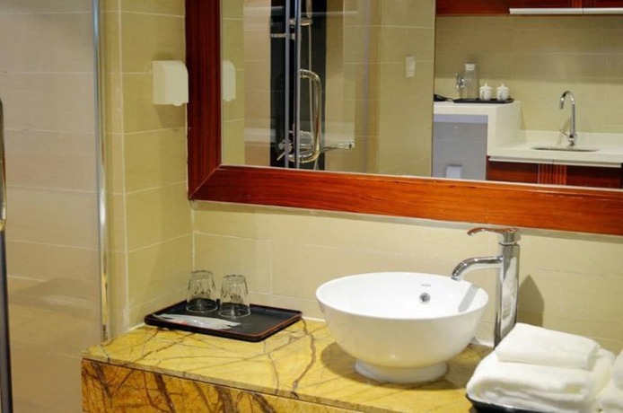 Imagen de la habitación del Hotel Huidong Ganghui Holiday. Foto 12