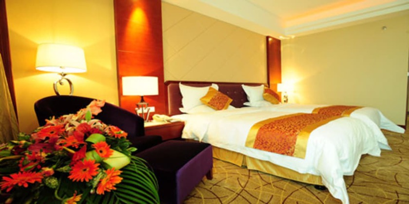 Imagen de la habitación del Hotel Huihua Garden. Foto 17