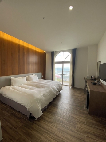 Imagen de la habitación del Hotel Huilan Edu. Foto 7