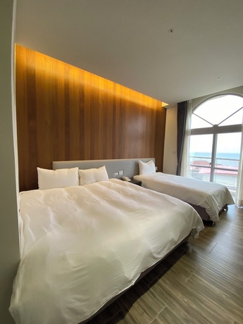Imagen de la habitación del Hotel Huilan Edu. Foto 10