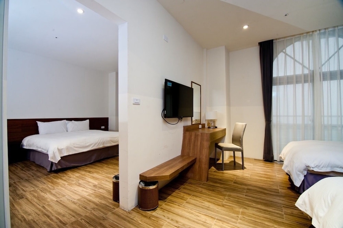 Imagen de la habitación del Hotel Huilan Edu. Foto 11