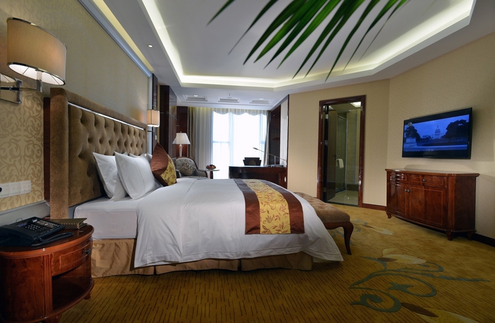 Imagen de la habitación del Hotel Huilihua. Foto 11