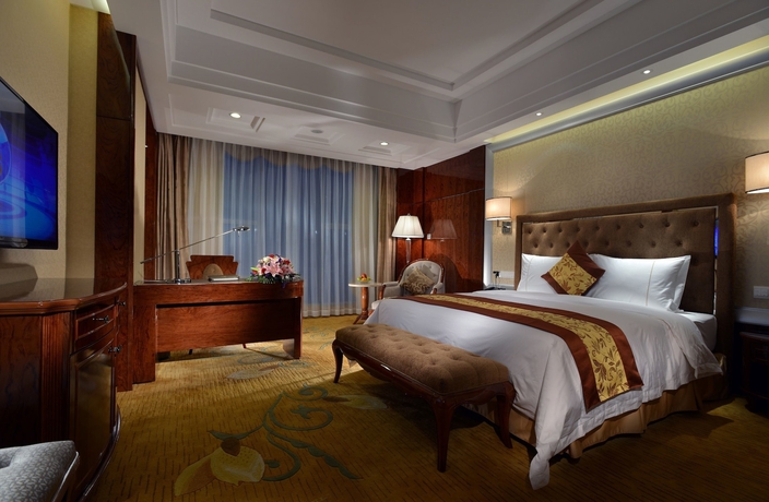 Imagen de la habitación del Hotel Huilihua. Foto 13