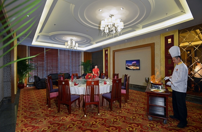 Imagen del bar/restaurante del Hotel Huilihua. Foto 8