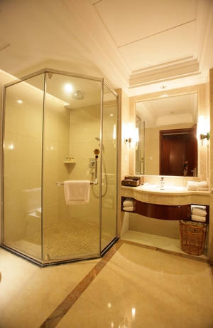 Imagen de la habitación del Hotel Huilihua. Foto 15