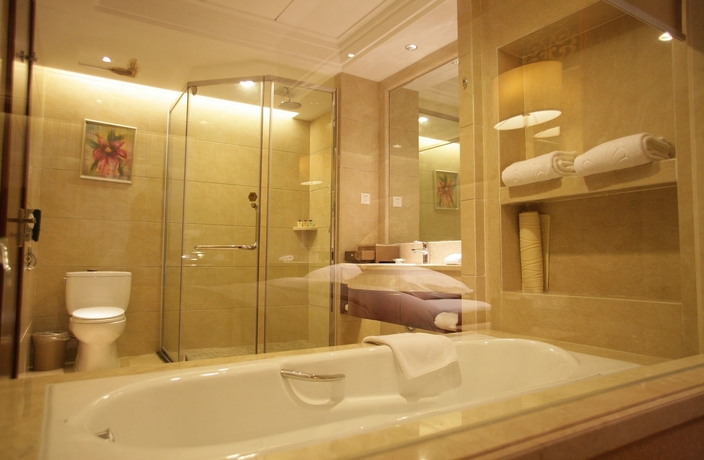 Imagen de la habitación del Hotel Huilihua. Foto 16