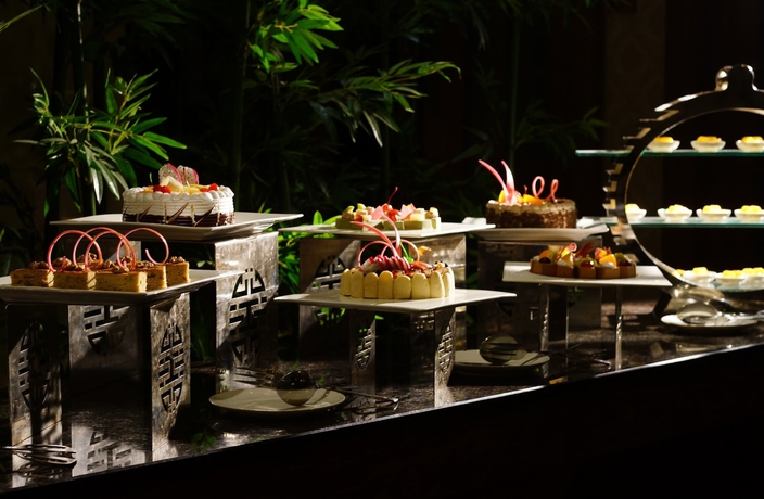 Imagen del bar/restaurante del Hotel Huilihua. Foto 10