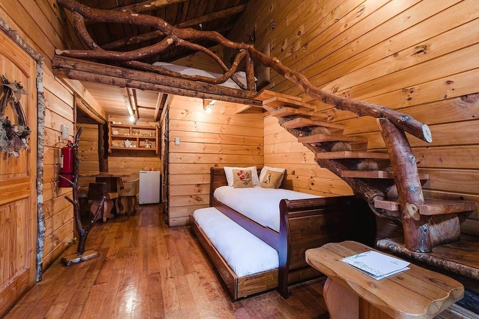 Imagen de la habitación del Hotel Huilo Huilo Cabanas del Bosque. Foto 2