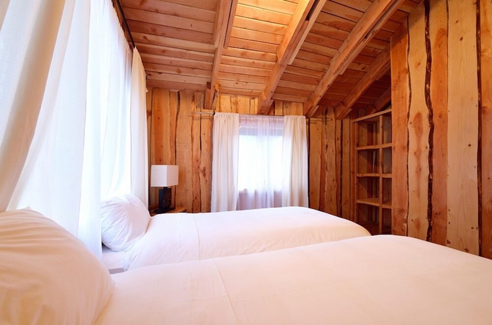 Imagen de la habitación del Hotel Huilo Huilo Cabanas del Bosque. Foto 5