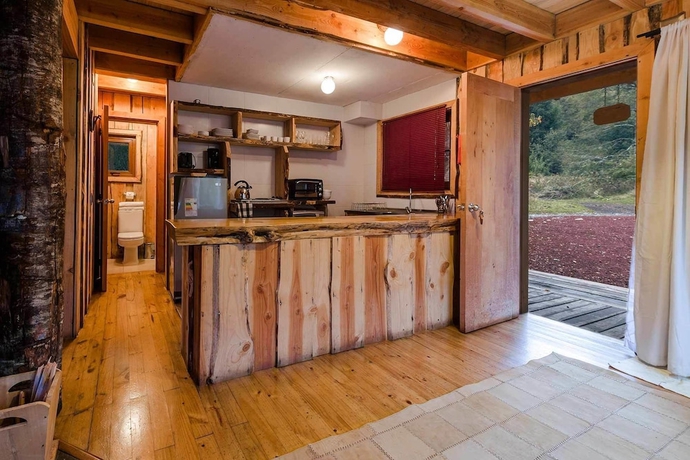 Imagen de la habitación del Hotel Huilo Huilo Cabanas del Bosque. Foto 10