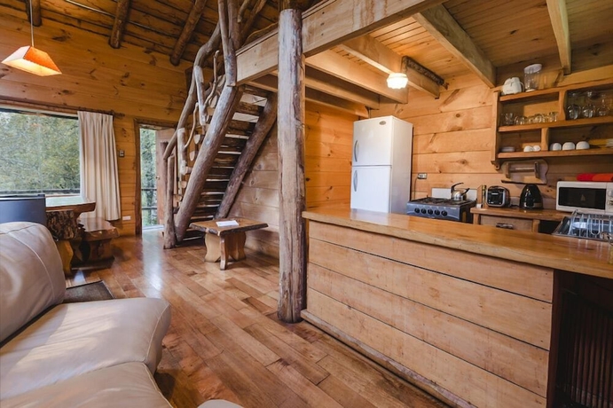 Imagen de la habitación del Hotel Huilo Huilo Cabanas del Bosque. Foto 11