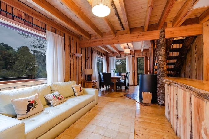 Imagen de la habitación del Hotel Huilo Huilo Cabanas del Bosque. Foto 12