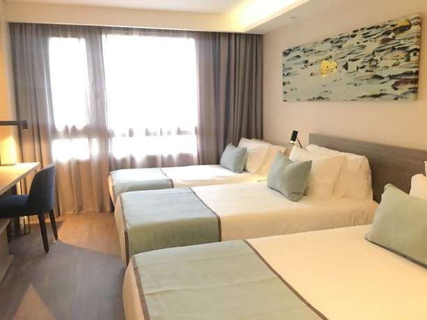 Imagen de la habitación del Hotel Huinid Obelisco. Foto 9