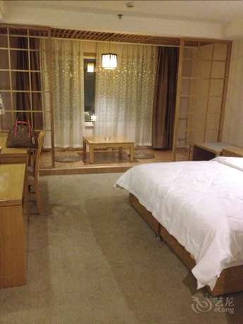 Imagen de la habitación del Hotel Huiquan Boutique Hotel. Foto 3
