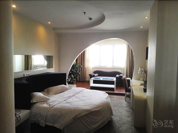 Imagen de la habitación del Hotel Huiquan Boutique Hotel. Foto 5