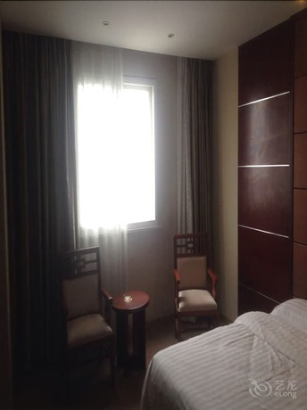 Imagen de la habitación del Hotel Huiquan Boutique Hotel. Foto 6