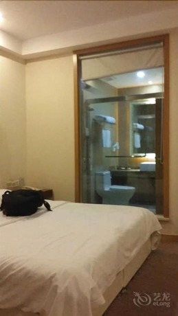 Imagen de la habitación del Hotel Huiquan Boutique Hotel. Foto 7