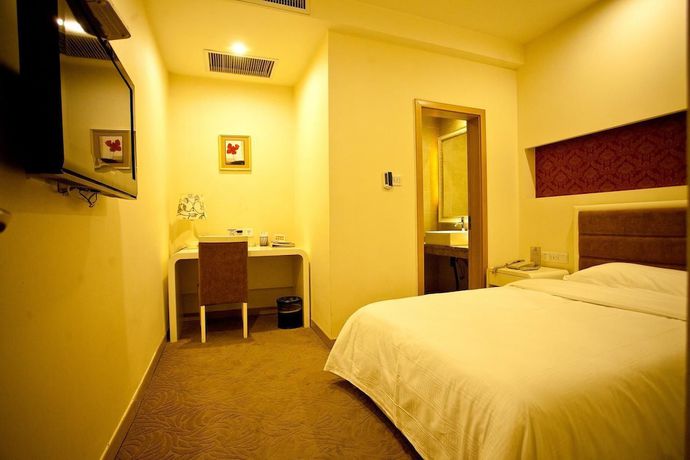 Imagen de la habitación del Hotel Huiquan Boutique Hotel. Foto 8