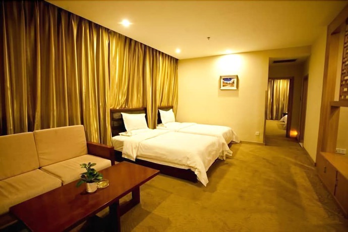 Imagen de la habitación del Hotel Huiquan Boutique Hotel. Foto 12