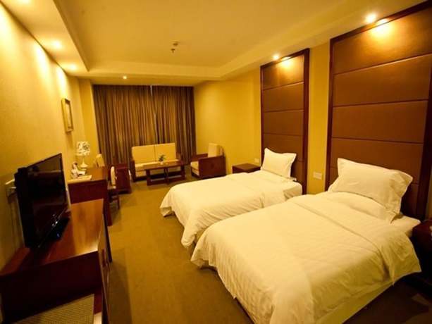 Imagen de la habitación del Hotel Huiquan Boutique Hotel. Foto 14