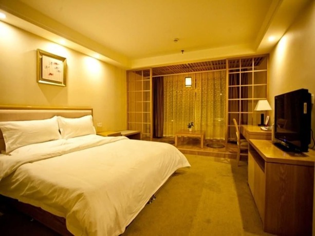 Imagen de la habitación del Hotel Huiquan Boutique Hotel. Foto 15