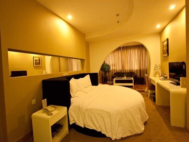 Imagen de la habitación del Hotel Huiquan Boutique Hotel. Foto 16