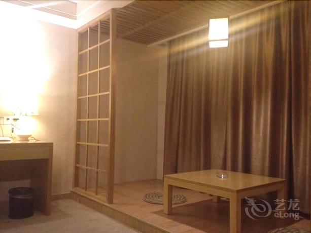 Imagen de la habitación del Hotel Huiquan Boutique Hotel. Foto 17