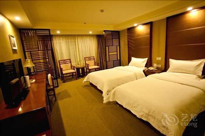 Imagen de la habitación del Hotel Huiquan Boutique Hotel. Foto 18