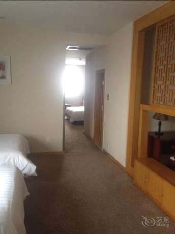 Imagen de la habitación del Hotel Huiquan Boutique Hotel. Foto 19