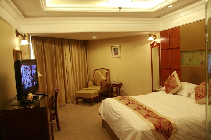 Imagen de la habitación del Hotel Huiquan Dynasty. Foto 8