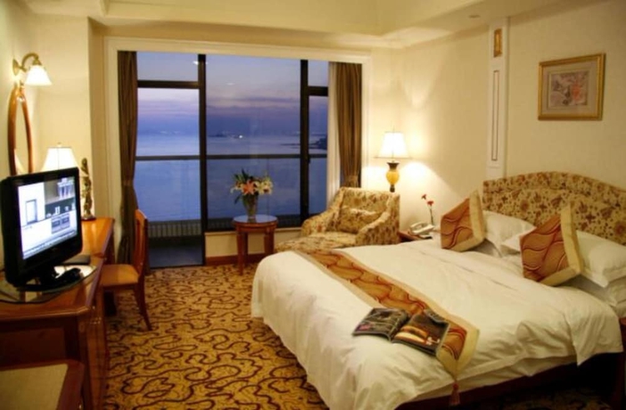 Imagen de la habitación del Hotel Huiquan Dynasty. Foto 12