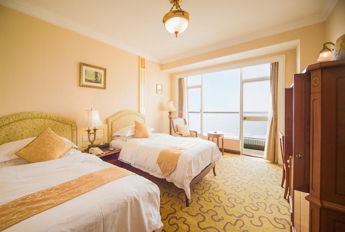 Imagen de la habitación del Hotel Huiquan Dynasty. Foto 16