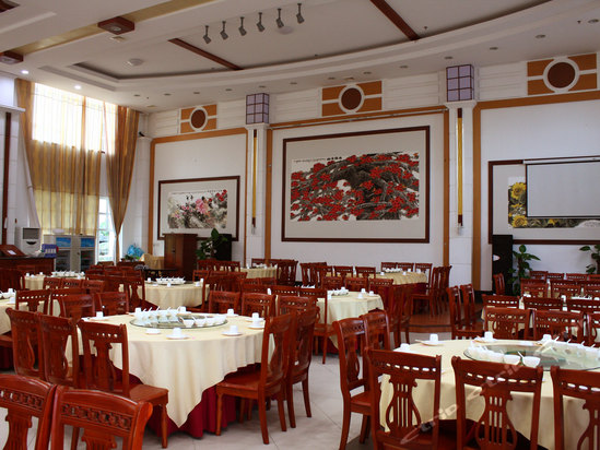 Imagen del bar/restaurante del Hotel Huizhou Coast Hotspring Resort. Foto 2