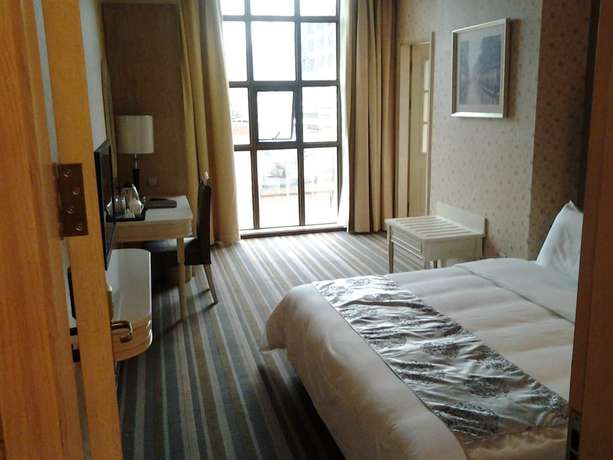 Imagen de la habitación del Hotel Huizhou Lige Hotel. Foto 4