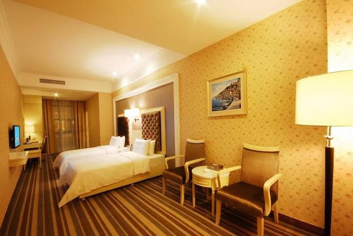 Imagen de la habitación del Hotel Huizhou Lige Hotel. Foto 14