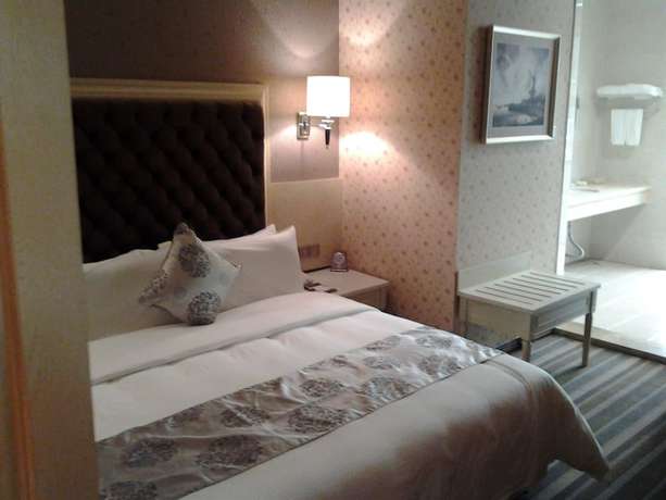 Imagen de la habitación del Hotel Huizhou Lige Hotel. Foto 16
