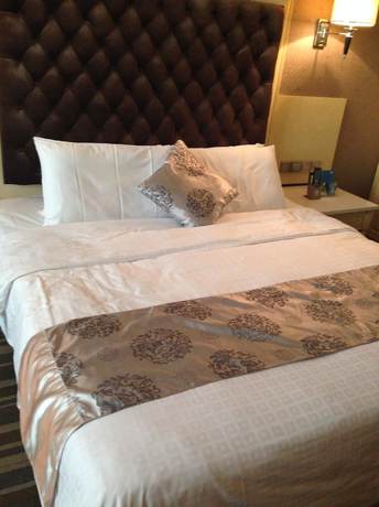 Imagen de la habitación del Hotel Huizhou Lige Hotel. Foto 18