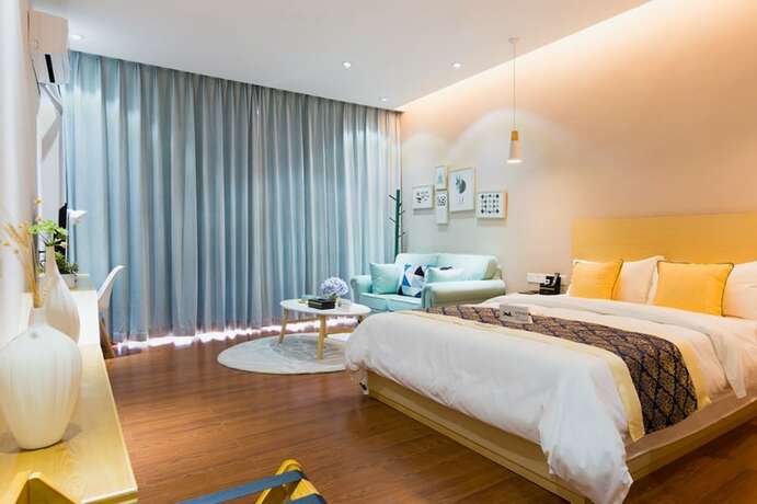 Imagen general del Hotel Huizhou Qu Wo Jia Shang Pin Apartment. Foto 2