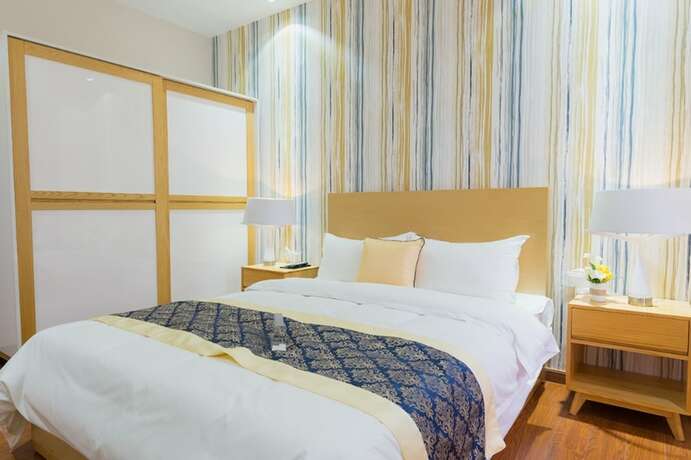 Imagen de la habitación del Hotel Huizhou Qu Wo Jia Shang Pin Apartment. Foto 14