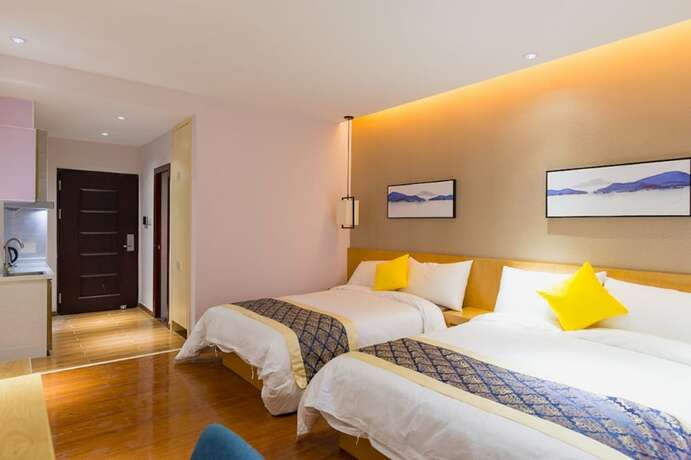 Imagen de la habitación del Hotel Huizhou Qu Wo Jia Shang Pin Apartment. Foto 17