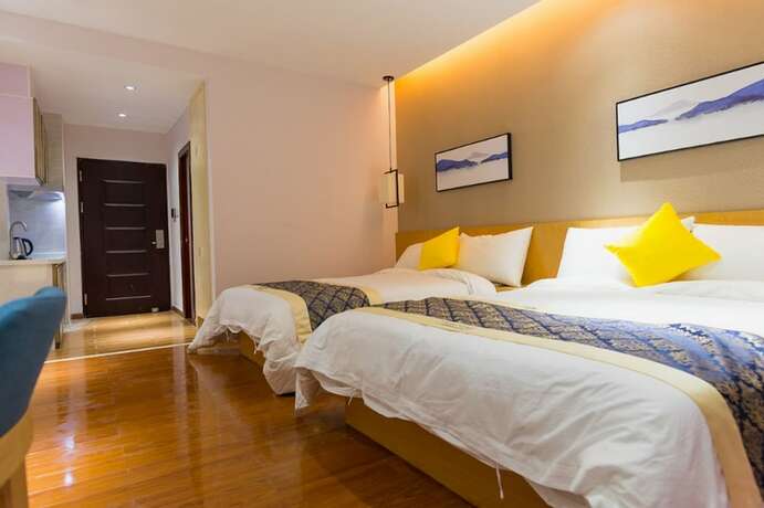 Imagen de la habitación del Hotel Huizhou Qu Wo Jia Shang Pin Apartment. Foto 19
